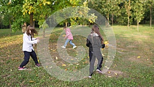 Group of happy children playing in the park
