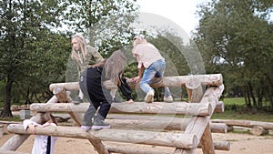 group of happy children playing in summer park