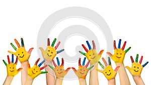 Group of happy children raises hands up. photo