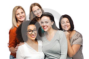 Group of happy different women in casual clothes