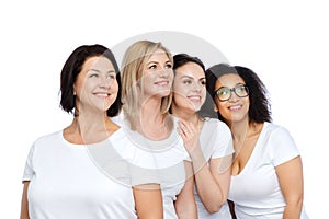 Group of happy different women in white t-shirts