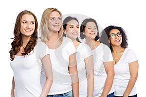 Group of happy different women in white t-shirts