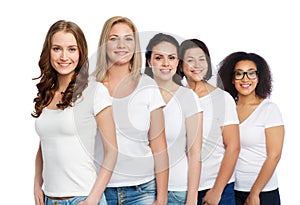 Group of happy different women in white t-shirts