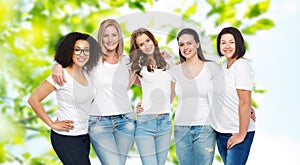 Group of happy different women in white t-shirts