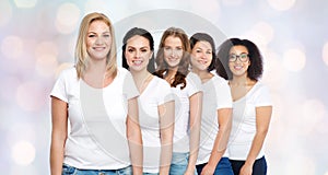 Group of happy different women in white t-shirts