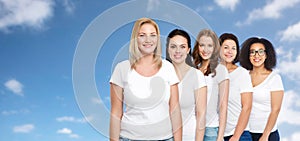 Group of happy different women in white t-shirts