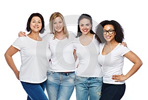 Group of happy different women in white t-shirts photo