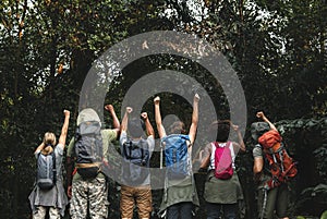 Group of happy diverse campers in trekking trip