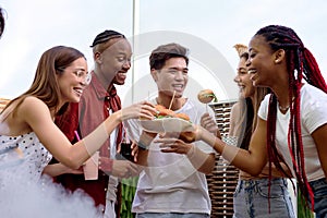 Group of happy diverse friends having fun at barbecue party outdoor in backyard