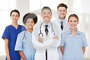 Group of happy doctors at hospital