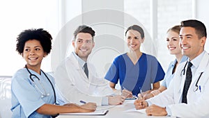 Group of happy doctors meeting at hospital office