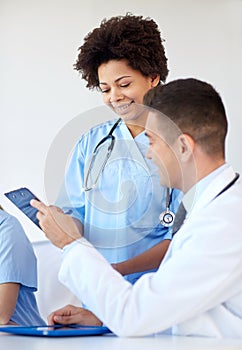 Group of happy doctors meeting at hospital office