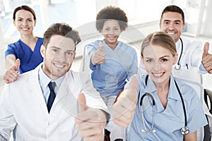 Group of happy doctors on seminar at hospital