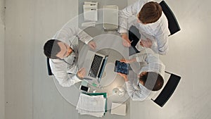 Group of happy doctors with tablet pc computers