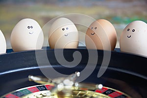 Group of happy eggs friends  make bets gambiling in the toy casino