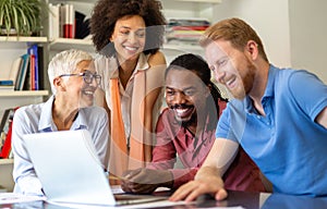 Group of happy friendly multiethnic business people having fun, working together in office