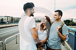 Group of happy friends hang out together