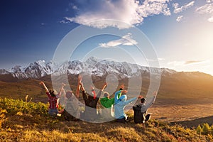 Group happy friends having fun mountain top