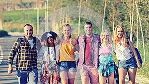 Group of happy friends having fun together outdoors