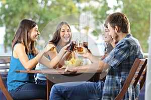 Group of happy friends toasting