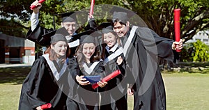 Group happy graduate students