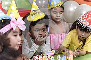 Group of happy and joyful kids have fun celebrating her birthday with Multinational friend Kids birthday celebratiion party