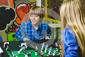 Group of happy kids playing in children room