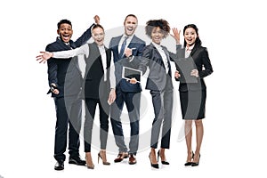 group of happy multiethnic businesspeople in formal wear