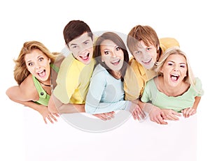 Group of happy people holding banner.