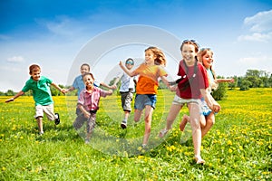 Group of happy running kids