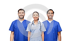 group of happy smiling doctors or nurses