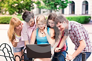 Group of happy smiling Teenage Students Outside College