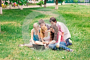 Group of happy smiling Teenage Students Outside College