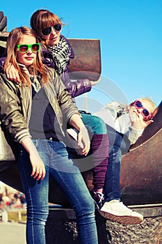 Group of happy teen girls on city street