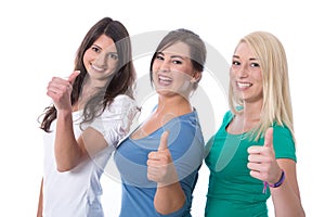Group of happy trainees girls in first jobs with thumbs up isolated on white background