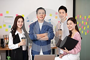 Group of Happy young business Startup coworkers working Brainstorming together to get ideas and marketing plan at office