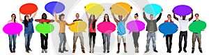 Group of happy young multi ethnic people holding speech bubbles