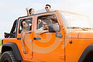 Group of happy young people laughing and having fun