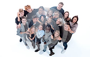 group of happy young people pointing at the camera.