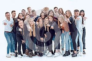 group of happy young people pointing at you