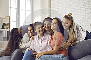 Group of happy young women enjoying their friendship and having fun time together