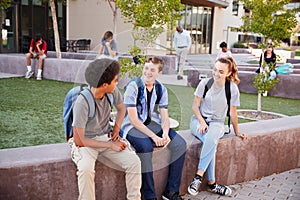 Group Of High School Students Hanging Out During Recess