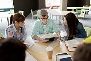 Group of high school students with tablet pc