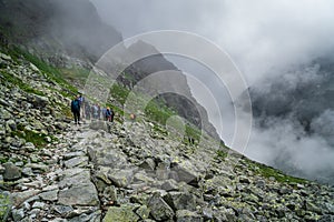 Group of hikers climbing to High Tatras, Slovakia