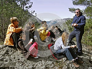 Group of hikers resting in nature