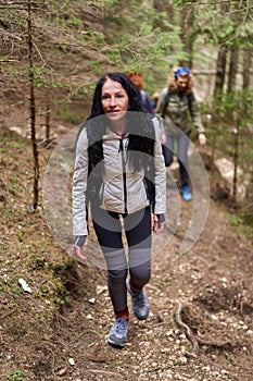 Group of hikers on a trail in the mountains