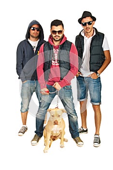 Group of hip hop guys with pitbull dog photo