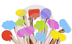 Group of Human Arms Raised with Speech Bubble