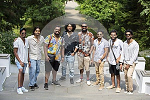 A group of Indian students. Young modern Indian men pose, enjoy life