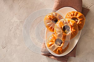 Group of individual pies with meat and potato - vak balish. Tatar traditional pies. White stone background. Top view.